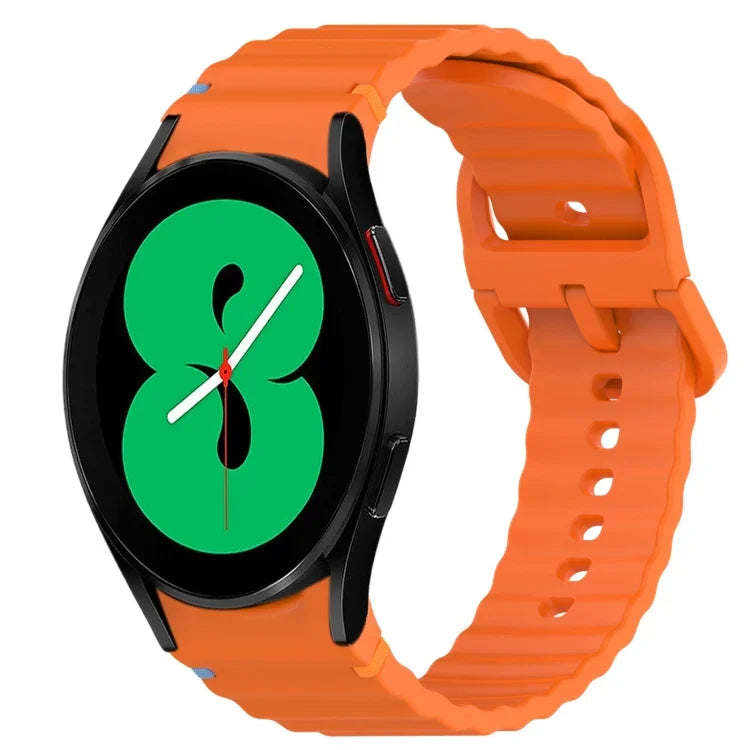 Wavy grain stitched silicone watch band for Samsung Galaxy Watch 4 in bright orange color.
